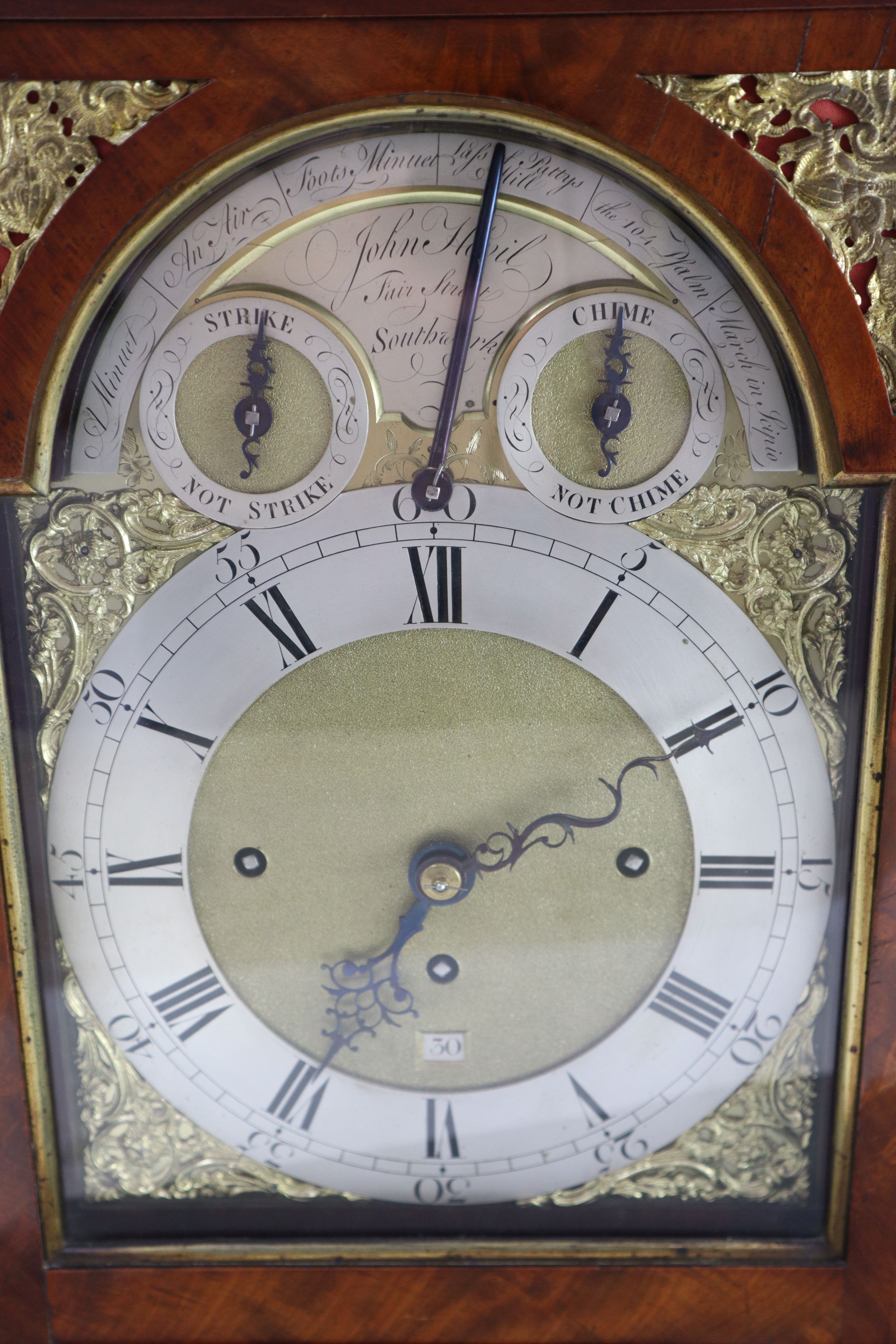 A good George III mahogany musical table clock playing six tunes, John Hovil, Fair Street, London